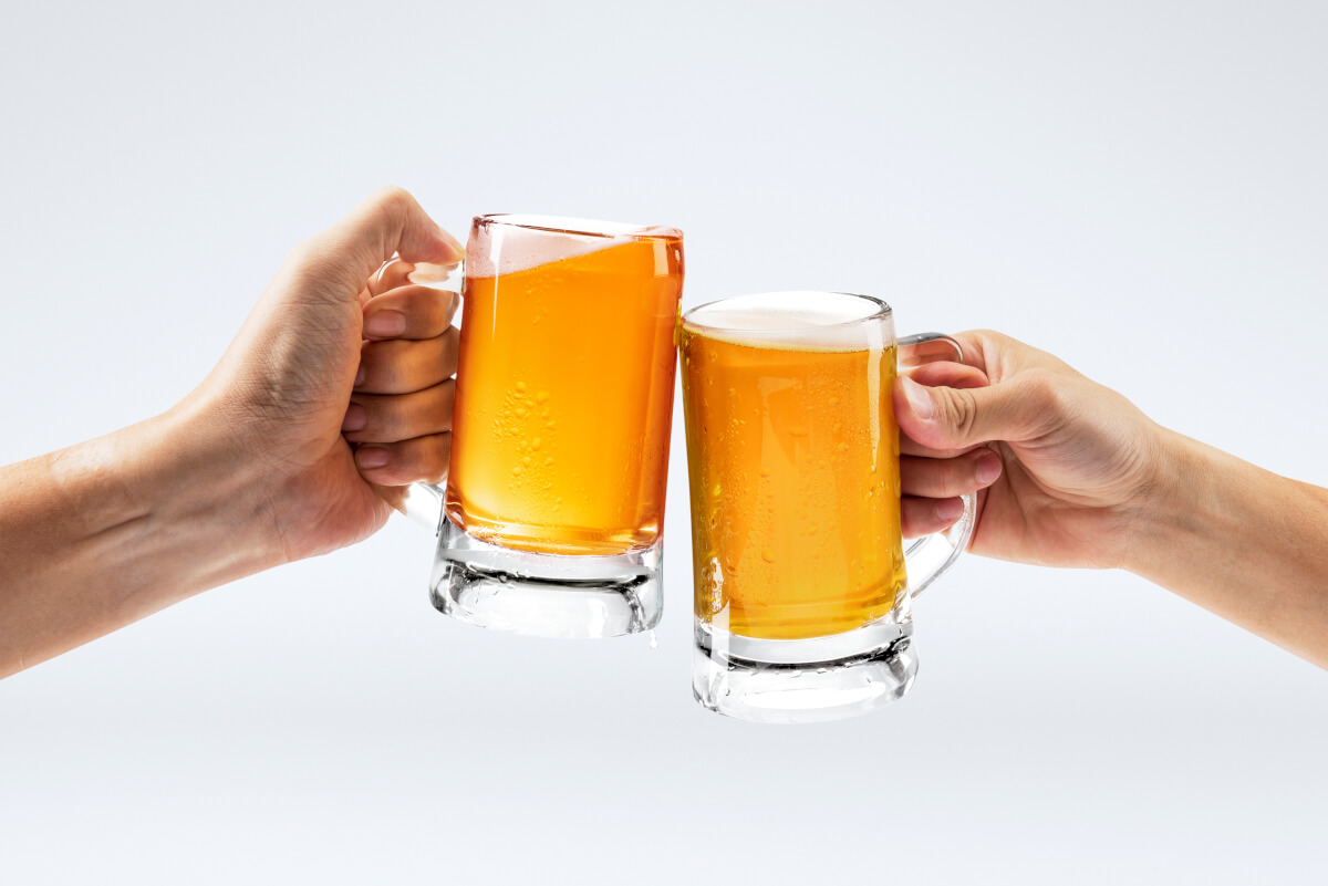 men toasting with beer white background