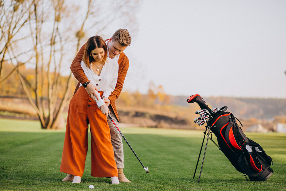 couple playing golf together 2