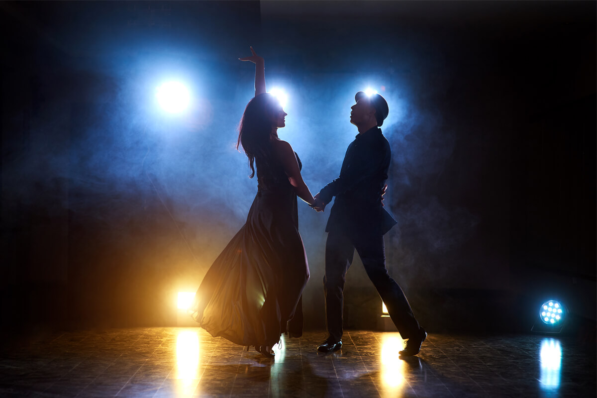 skillful dancers performing dark room concert light smoke sensual couple performing artistic emotional contemporary dance